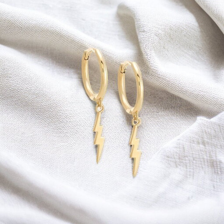 Gold Raye Huggie Earrings